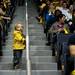 A young Michigan fan walks into the aisle and waits for the basketball team to arrive on Tuesday, April 9. AnnArbor.com I Daniel Brenner